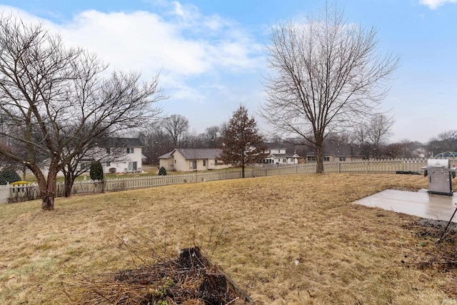 view of yard with a patio and fence