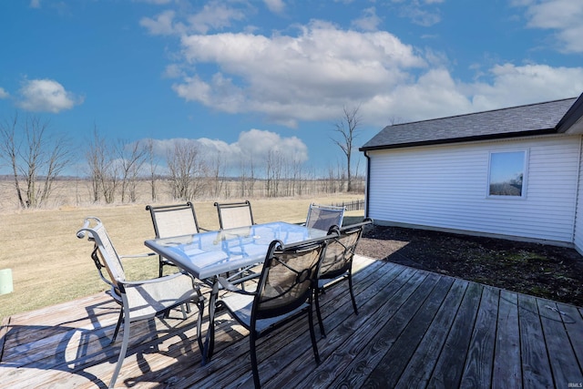 wooden deck featuring outdoor dining space