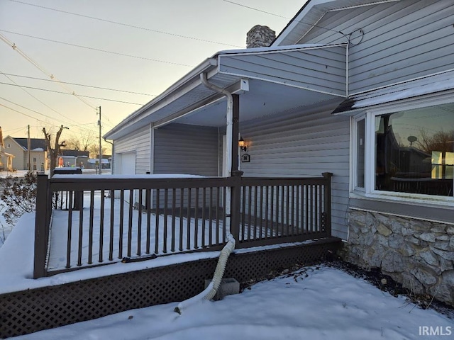 view of snow covered deck