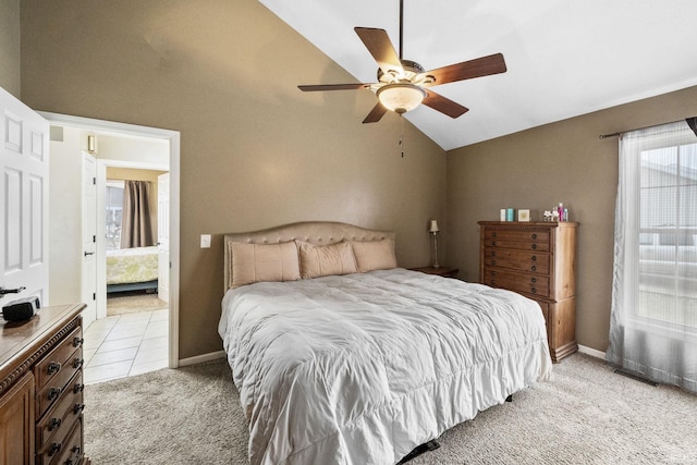 bedroom featuring visible vents, light colored carpet, baseboards, and lofted ceiling