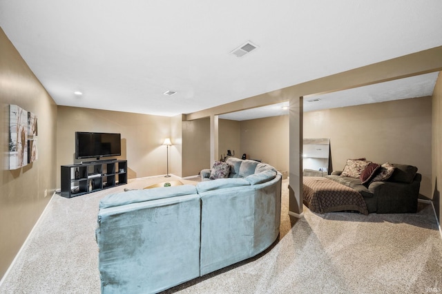 living room with carpet flooring, baseboards, and visible vents