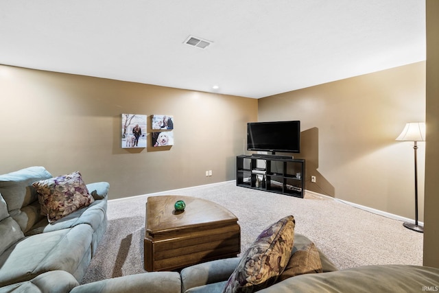 carpeted living room with baseboards and visible vents