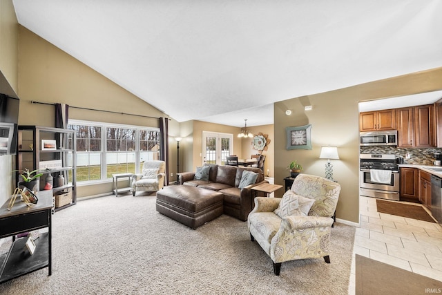 living area featuring baseboards, high vaulted ceiling, light tile patterned flooring, light carpet, and a notable chandelier