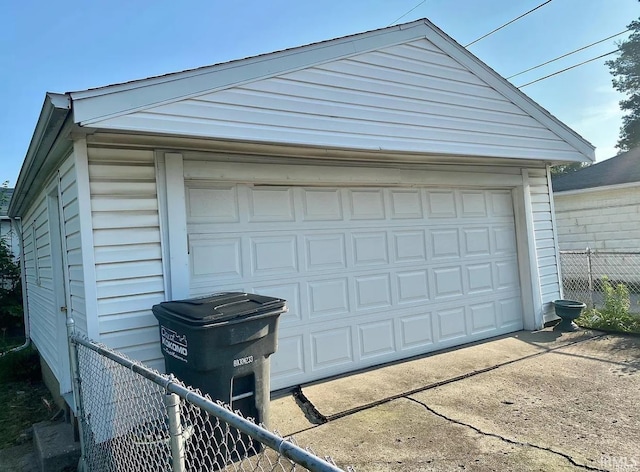 detached garage with fence