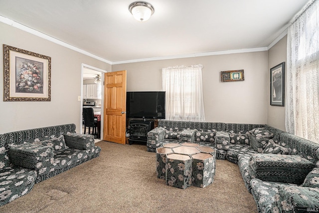 living room featuring crown molding and carpet flooring