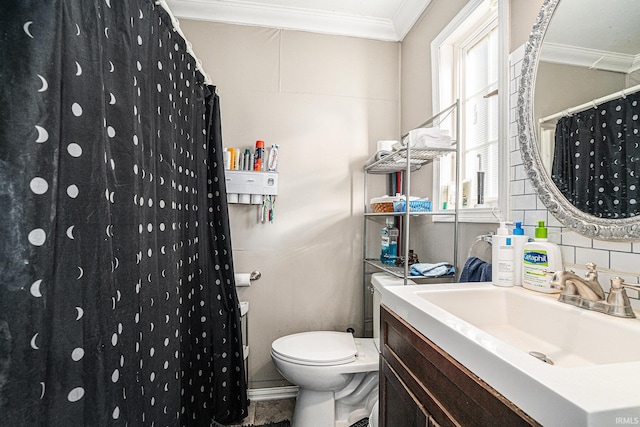 full bath with backsplash, vanity, toilet, and crown molding