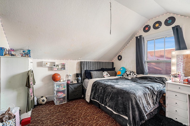 carpeted bedroom with lofted ceiling and a textured ceiling