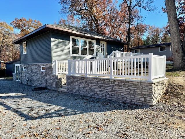 view of front of house with a deck