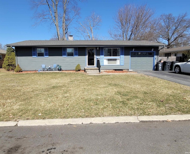 ranch-style house featuring entry steps, aphalt driveway, an attached garage, a front yard, and a chimney