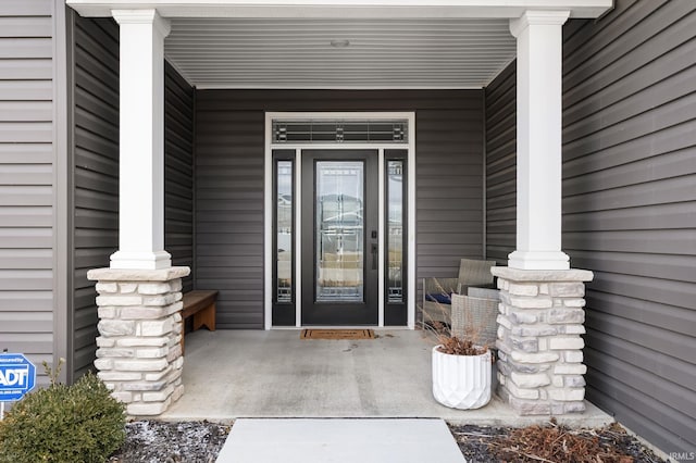 property entrance with a porch