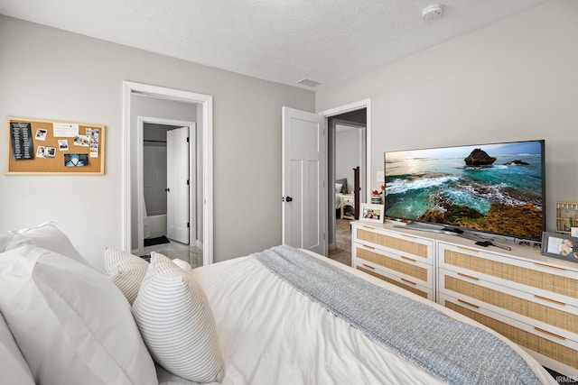 bedroom with a textured ceiling