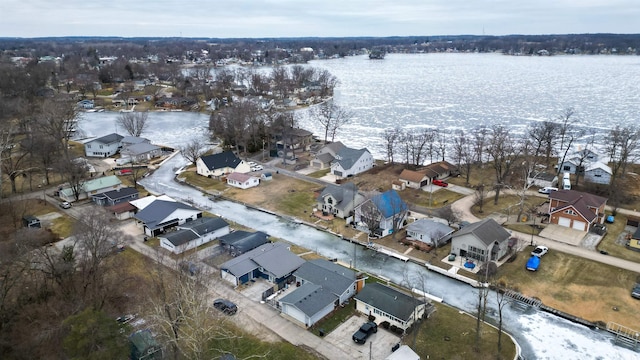 aerial view with a residential view and a water view