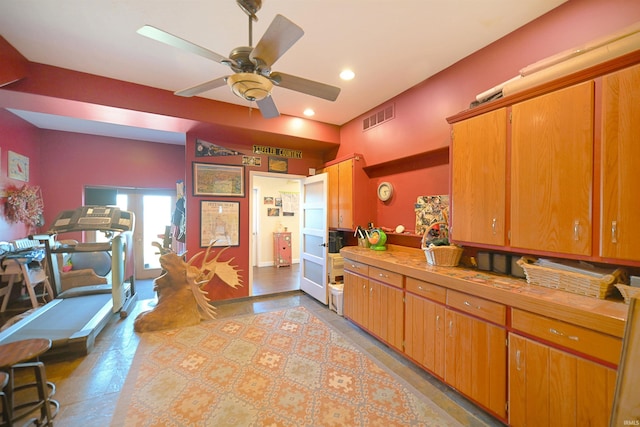 kitchen featuring visible vents, ceiling fan, light countertops, recessed lighting, and brown cabinetry