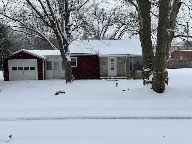 single story home featuring a garage