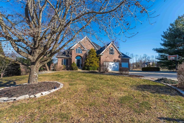 traditional-style house featuring brick siding, concrete driveway, and a front yard