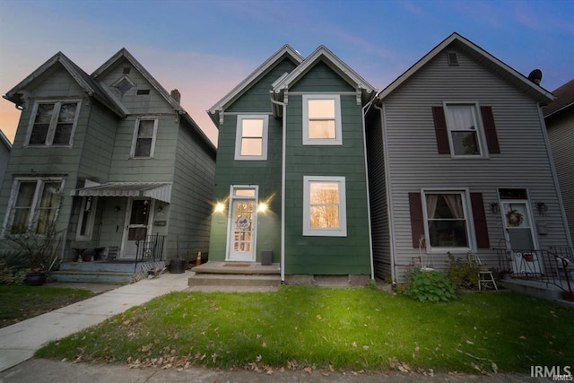 view of front of property with a front lawn