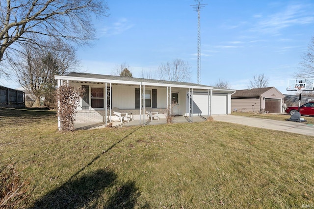 view of front of house with an attached garage, brick siding, a porch, and a front yard