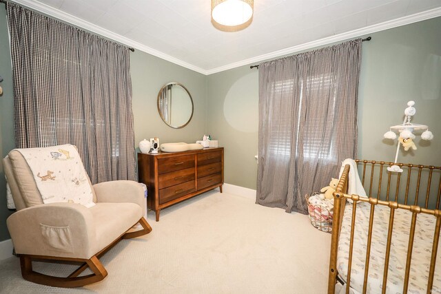 living area featuring crown molding and carpet floors