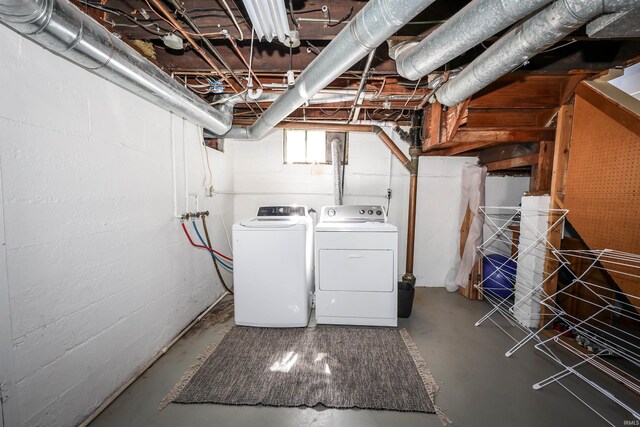 basement with washing machine and dryer