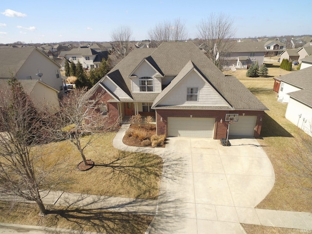 traditional home featuring a residential view, brick siding, roof with shingles, and concrete driveway