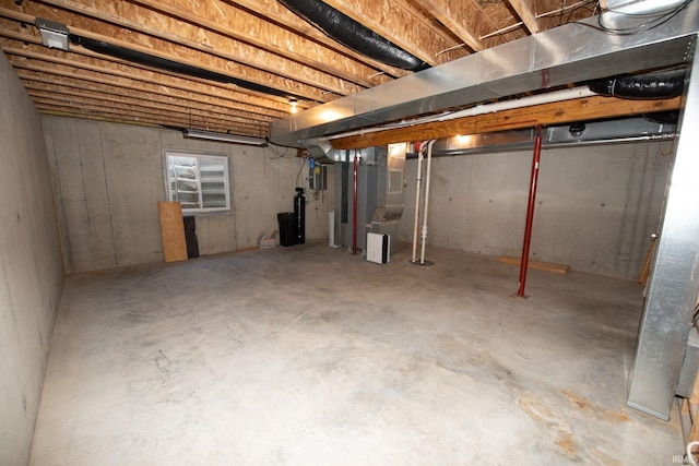 unfinished basement with heating unit