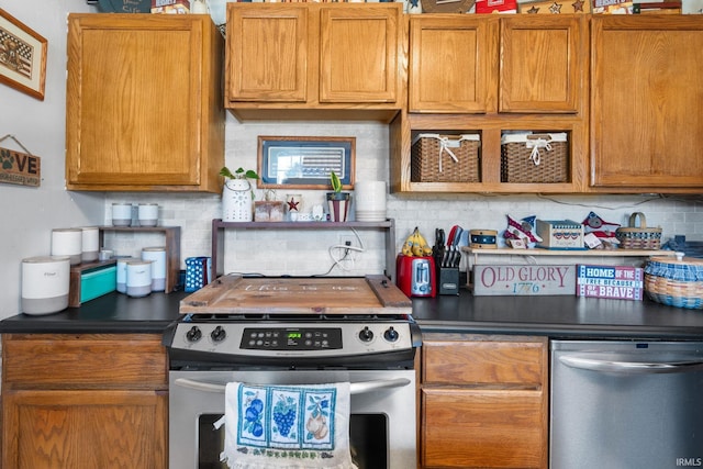 kitchen with dark countertops, brown cabinets, and stainless steel appliances