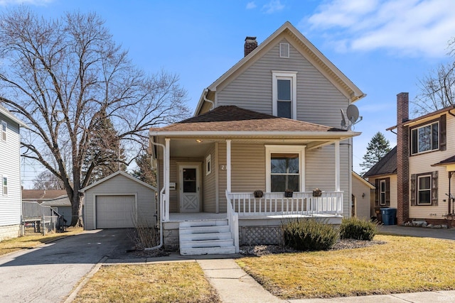 view of front of house featuring covered porch, a shingled roof, an outdoor structure, a garage, and aphalt driveway