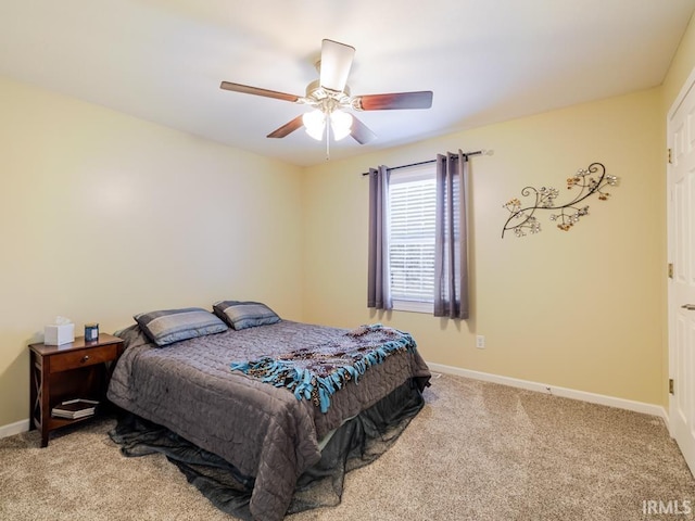 bedroom with baseboards, carpet floors, and ceiling fan