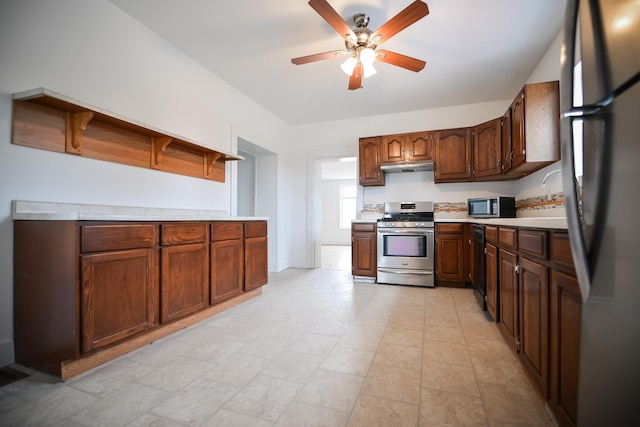 kitchen with black appliances, under cabinet range hood, open shelves, light countertops, and ceiling fan