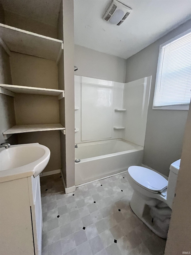 full bath featuring tile patterned floors, visible vents, toilet, washtub / shower combination, and vanity