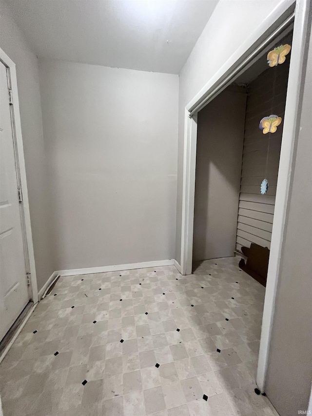 hall featuring tile patterned floors