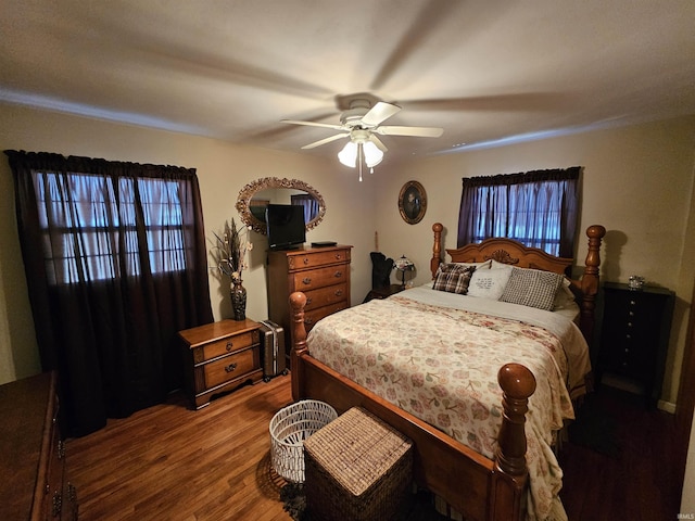 bedroom featuring ceiling fan and wood finished floors