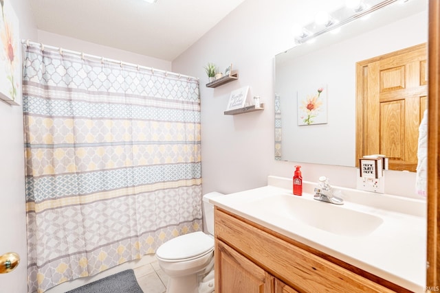 full bath featuring vanity, tile patterned floors, toilet, and a shower with curtain