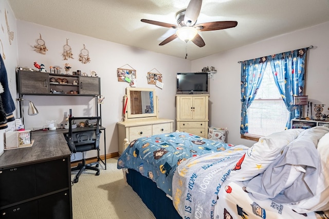 bedroom with light colored carpet, a textured ceiling, and ceiling fan