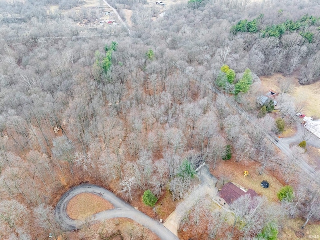 aerial view featuring a forest view