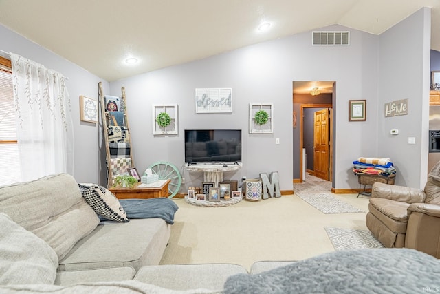 carpeted living area with visible vents, lofted ceiling, and baseboards