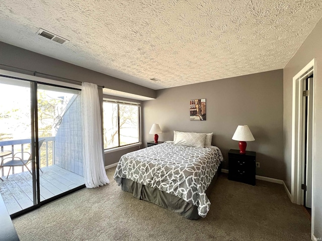 bedroom with visible vents, baseboards, carpet flooring, a textured ceiling, and access to outside