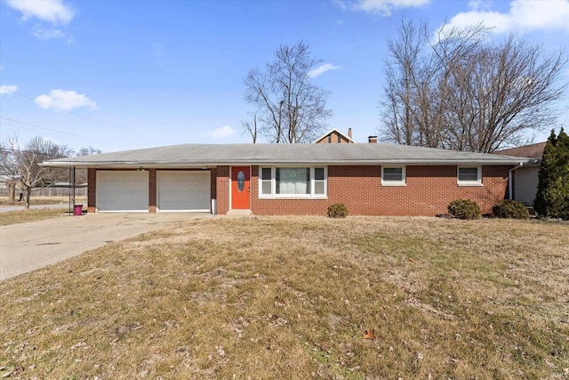 ranch-style house with a front lawn, an attached garage, brick siding, and driveway