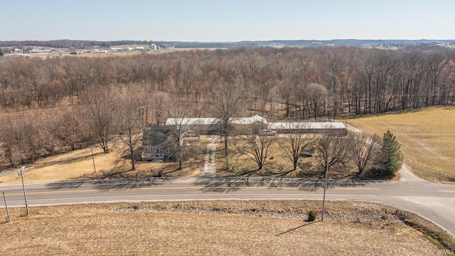 birds eye view of property featuring a rural view