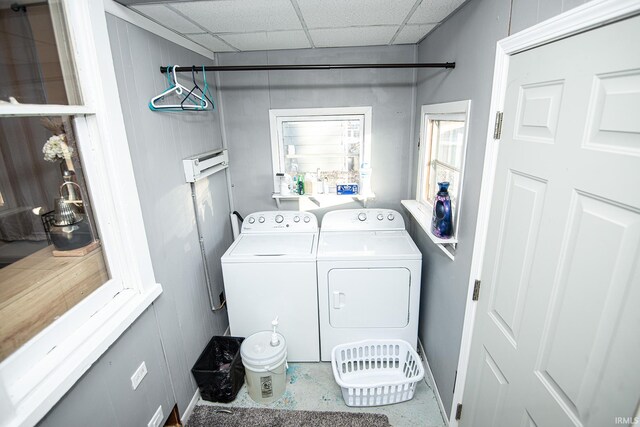 laundry area with laundry area and washer and clothes dryer