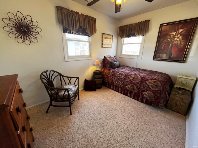 bedroom featuring baseboards, carpet, and ceiling fan