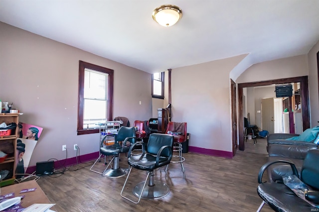 rec room with wood finished floors and baseboards