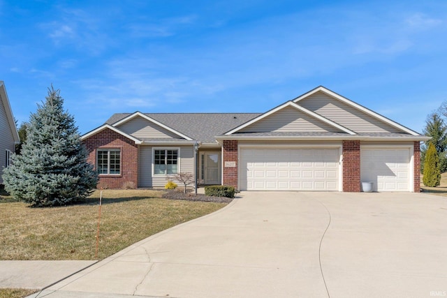 single story home featuring brick siding, driveway, a front lawn, and an attached garage