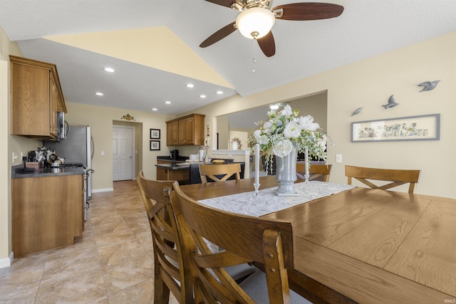 dining space featuring recessed lighting, baseboards, a ceiling fan, and vaulted ceiling