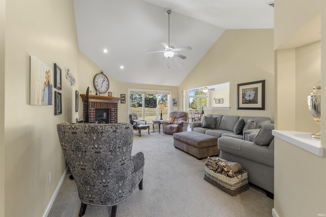 living room with ceiling fan, baseboards, carpet floors, a fireplace, and high vaulted ceiling