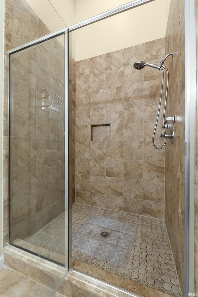 bathroom with a stall shower