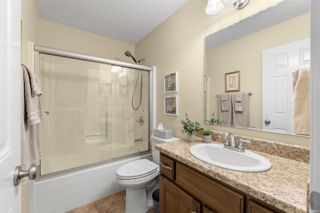 full bathroom with shower / bath combination with glass door, toilet, vanity, and tile patterned flooring