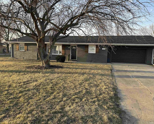 ranch-style home featuring brick siding, concrete driveway, a front yard, crawl space, and an attached garage