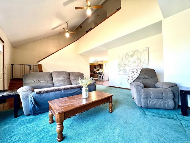 living area featuring a ceiling fan, baseboards, high vaulted ceiling, and carpet flooring