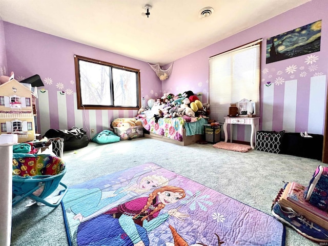 carpeted bedroom with visible vents